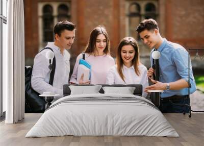 Group of college students with laptop and tablet computer at campus. Education concept. Wall mural